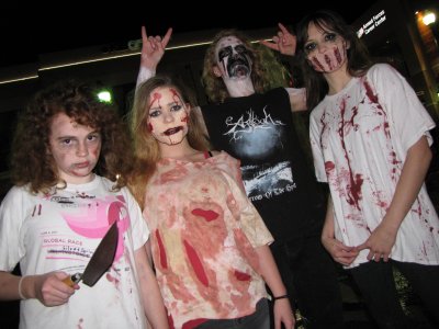  This group had some amazing effects going on.  The girl to the left had words scratched out and changed, the girl next to her had gauze around her mouth, the guy had some pretty awesome makeup, and the girl to the far right had fashioned a grille out of gauze that she wore over her mouth.
