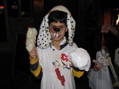  This costume reminded me, in a weird way, of a zombie version of Chuck E. Cheese.  It also reminded me of this picture from a Showbiz Pizza nostalgia group I'm part of on Facebook, showing Billy Bob holding the severed head of Chuck E. Cheese (Concept Unification is still something of a sore spot).  I'm probably reading far too much into this, but it amused me.