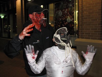 Zombie mummy meets zombie cigarette man.  Could almost see him moaning, "Nicotine!" instead of "Brains!"