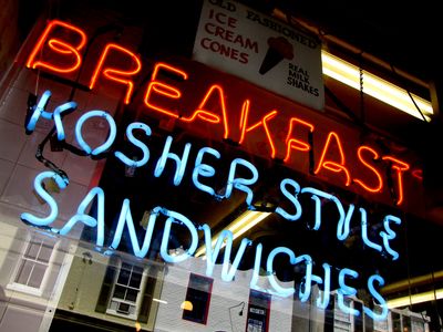  Neon sign in the window of a restaurant.