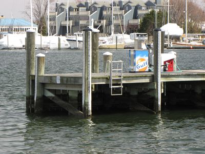 Gas pump on a dock, for fueling boats.