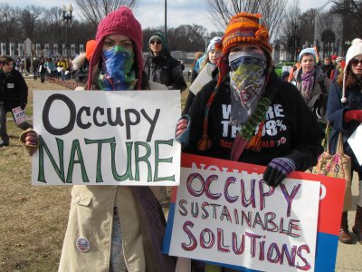 Bandanna masks with "OCCUPY" signs