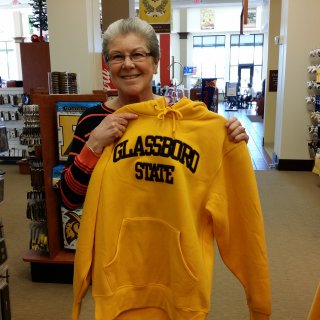 Mom poses with a Glassboro State hoodie