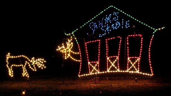 Reindeer stables.  This sort of reminds me of the last frame from a Calvin and Hobbes strip where Hobbes says, "After today, I'll bet Santa takes a shovel to the reindeer stalls to fill your stocking."