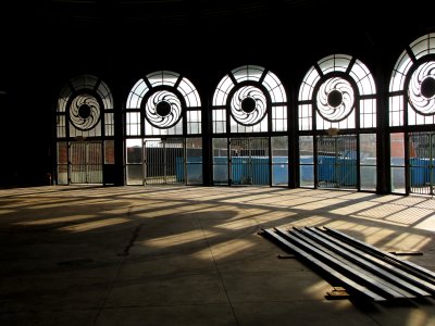 Empty interior of the Casino's carousel house.  A photo of me on the old Casino carousel is posted on Schumin Web in a 2004 Journal entry titled "Greetings from Asbury Park!"  The interior of the carousel house is now painted black, and a wall has been built at the east end of the carousel house.