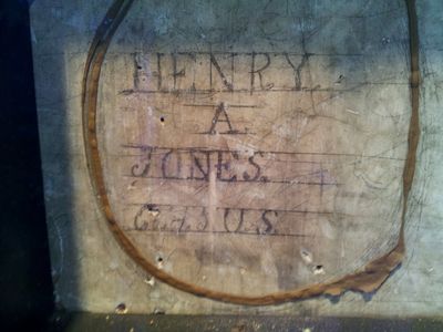 These three photos show detail of Civil War-era graffiti on the courthouse walls.  The way the graffiti was presented was that they cut out sections of the modern wall to reveal the graffiti, and then put glass over the cutout to preserve the graffiti.