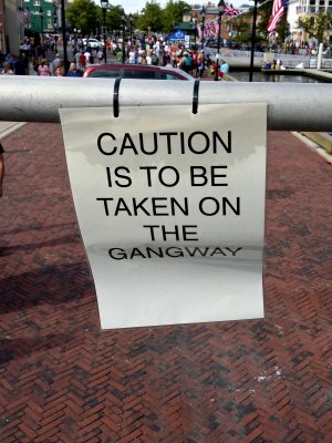 The phrasing of this sign, cable-tied to the gangway railing, struck Elyse and me as being very British.