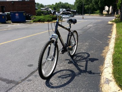 The bicycle in the parking lot for the Matthew Henson Trail