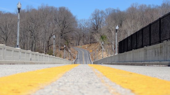 Low view down the middle of Brighton Dam Road, facing Howard County.