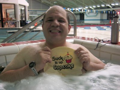 Posing with my "Suck it up, cupcake" swim cap.