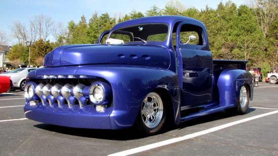 This car is a highly-modified Ford F-1 pickup truck.  Likely because you see far fewer classic trucks than you do classic cars, these kinds of vehicles really strike me as interesting, especially when you consider how low to the ground these trucks are compared to modern trucks.