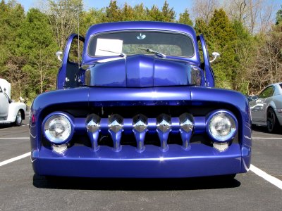 This car is a highly-modified Ford F-1 pickup truck.  Likely because you see far fewer classic trucks than you do classic cars, these kinds of vehicles really strike me as interesting, especially when you consider how low to the ground these trucks are compared to modern trucks.