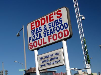 The sign at Eddie's Soul Food is the standard KFC design, minus the chicken bucket on top.