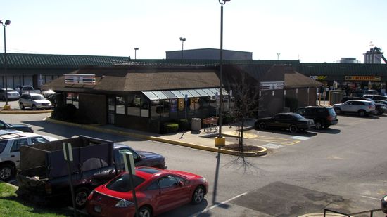 This 7-Eleven is a former 1980s-style Burger King. It would have looked similar to this when it was Burger King. According to Street View imagery, this housed a branch of the DC DMV until some time between July 2009 and July 2011. The only imagery that shows the building as a 7-Eleven is from this year, which makes me think that this was a recent change.