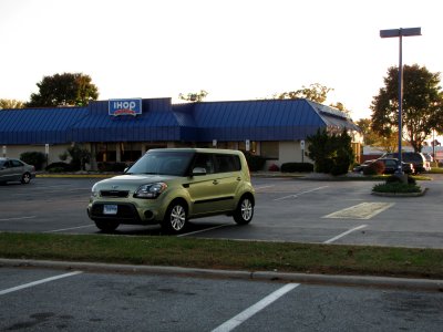 My car parked in the same space and in the same orientation as the "lumber car"