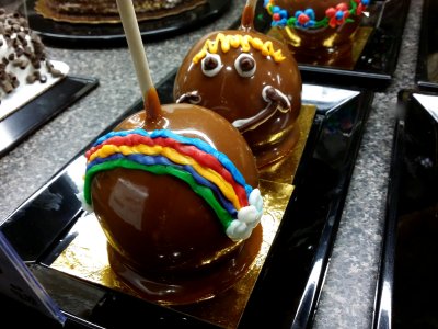 Caramel apples with frosting decoration