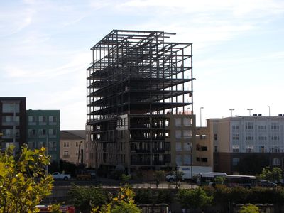 This is the Computer Building in Wheaton, photographed from the Metro garage.  The building used to be a five-story office building off of Georgia Avenue in Wheaton, but in 2013, work began to enlarge the building and completely renovate it to turn it into apartments.  I was surprised that they were using the existing building as a base, but apparently the building was worth retaining.