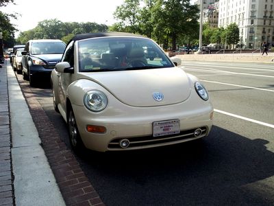 DC Councilman Jim Graham's Volkswagen convertible parked in front of the John Wilson Building.  Considering our previous encounter on the road, I was tempted to leave a note on his windshield reading, "Dear Jim, drive carefully.  Love, Ben."  Considering the way he drives, I'm amazed that he's kept the car in one piece all this time.