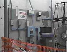 Still from a home video in 1997. This is the electrical room at the Cape Hatteras Lighthouse, at the top of the stairs. I want to take lots more pix of this room this weekend.