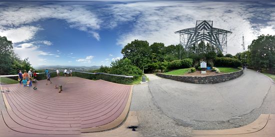 The Roanoke Star and overlook, while standing on a bench