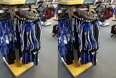 A rack full of Dolfin swimsuits.  It sort of reminds me of the suit that my friend Suzie wears, but she wears Nike.