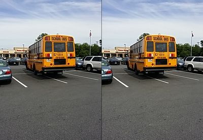 School bus 13514 parked across four spaces