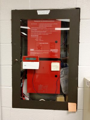 The fire alarm panel, a DSC Maxsys PC4020CF, which replaced an Edwards Custom 6500 system in 2005.