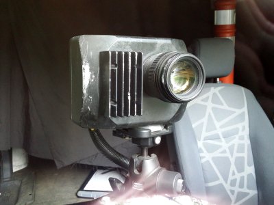 The camera unit inside the van, viewed through the windshield