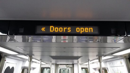 The interior LEDs at the ends of the car.  This replaces the simple "<<<" that the older railcars show to indicate door side.