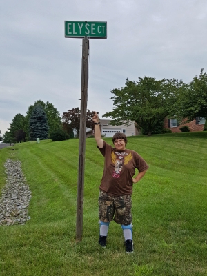 Elyse with the Elyse Court sign