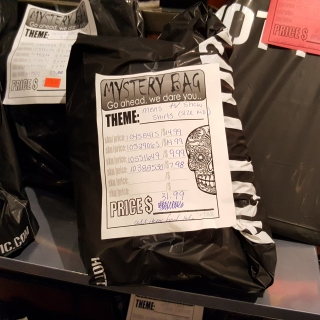 Mystery bags, especially at this sort of price, seen here at Hot Topic, seem like a ripoff waiting to happen. Especially with the all-sales-final note on the bag.