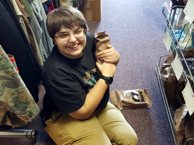 Elyse holds the beef patty MRE.