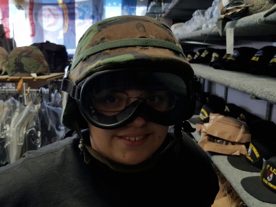 Trying on a helmet and goggle set.