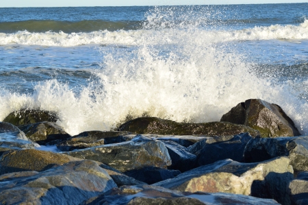 Waves breaking on rocks.