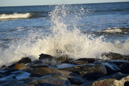 More waves breaking on rocks. Look at the horizon on this photo, though. That's the only thing about photographing around the ocean: the horizon is supposed to be level. This photo looks pretty nice, except that the horizon is all cockeyed.