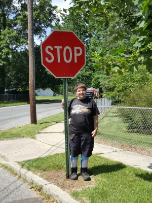 Elyse with the "falling down stop sign"