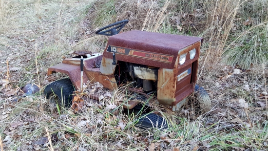 The tractor was now missing its seat. We found the seat on the ground nearby.