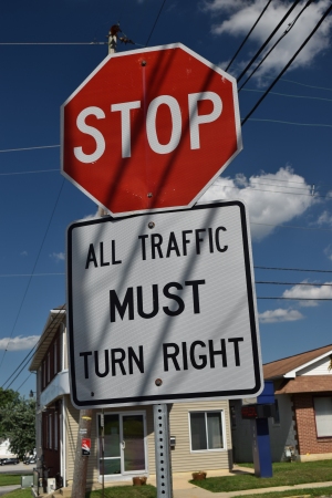 "All traffic MUST turn right"