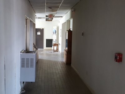 View through a door in the lobby building. If memory serves, the former front desk is through that opening to the right.