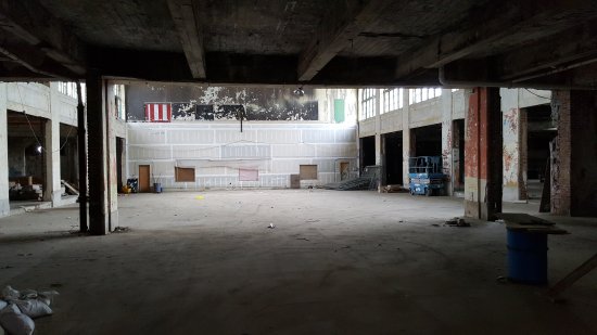 Looking straight back towards the walled-off carousel house. The former Mad-O-Rama space is back and to the right.