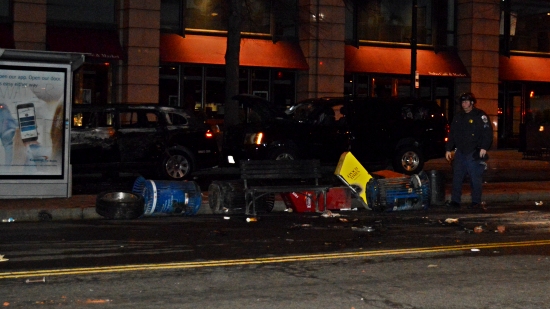 A small trail of destruction, with the burned out limousine in the background.