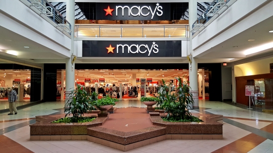 Mall entrances for Macy's, viewed from the lower level. Note the "store closing" signs inside.