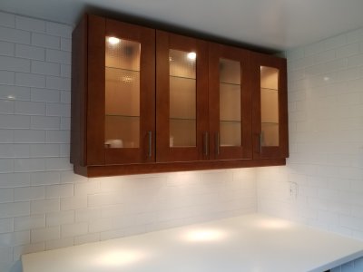 The bar area in the kitchen.  This excites me, because my apartment has a breakfast bar, but it's mounted too low to actually be useful for that purpose, and so it ends up holding junk.