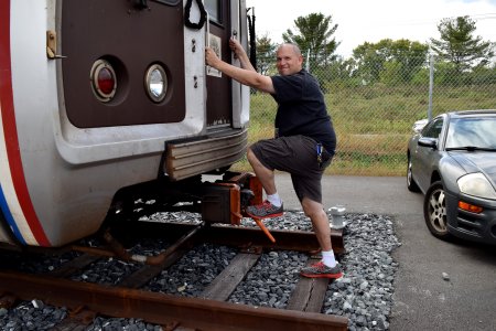 Dave poses like he's about to climb into the train