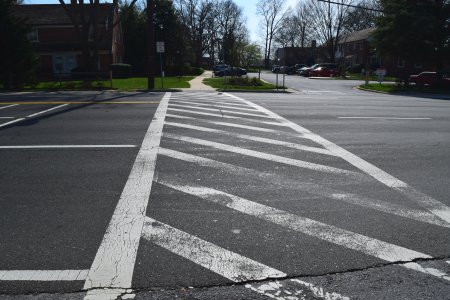 The crossing itself.  Note no median or pedestrian refuge island.  That meant that you had to do all four lanes at once, with no signals or warning lights, with a 35 mph speed limit for traffic.