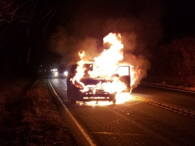 Eight seconds later, the fire has burned through the Kia logo on the hood.  I specifically remember watching that happen, stunned.