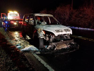 The remains of my Kia Soul, viewed from the front.  The fire had turned my green car white.