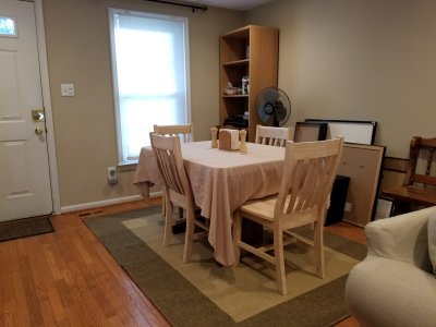 The unfinished chairs, in place in the living room