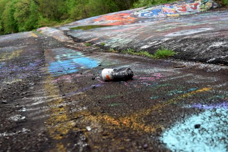 Another discarded paint can.