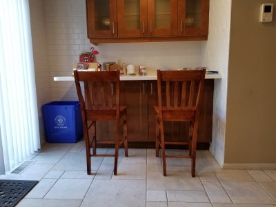 The completed chairs in front of the breakfast bar.